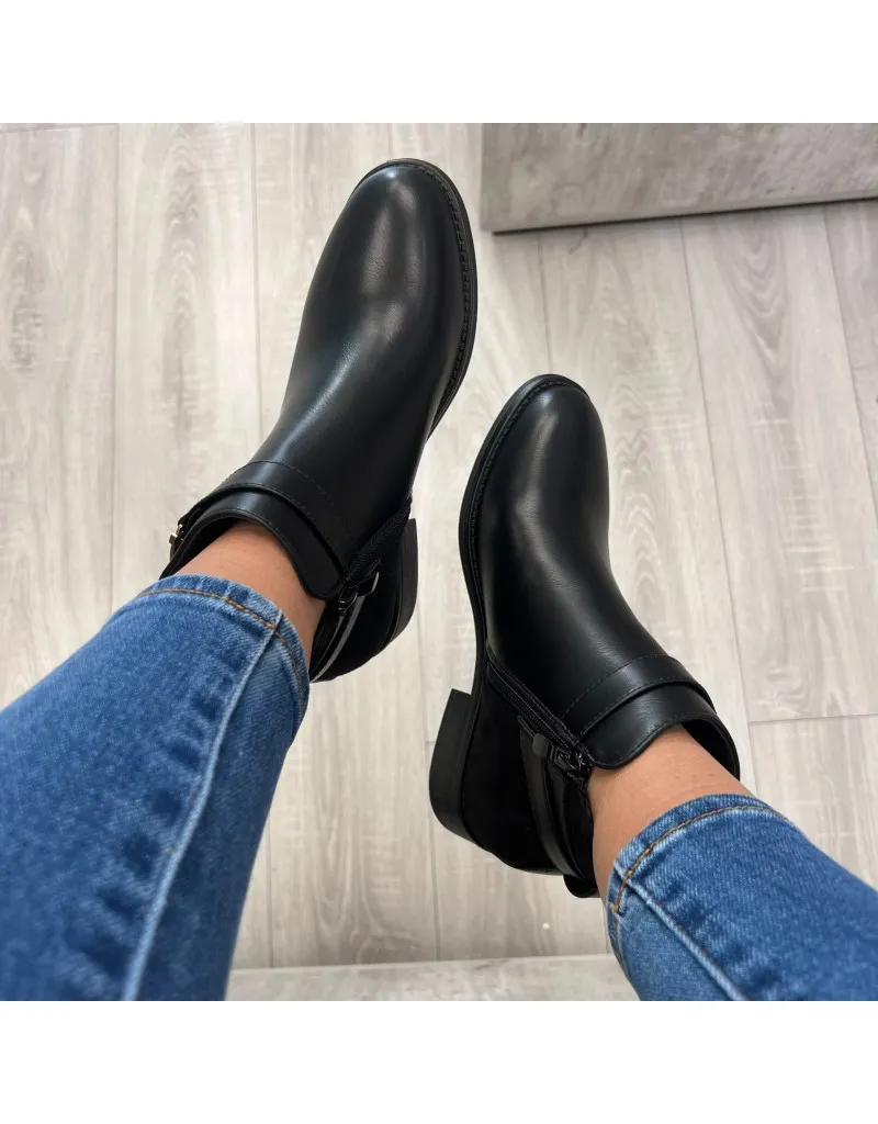 Black buckle ankle boot.