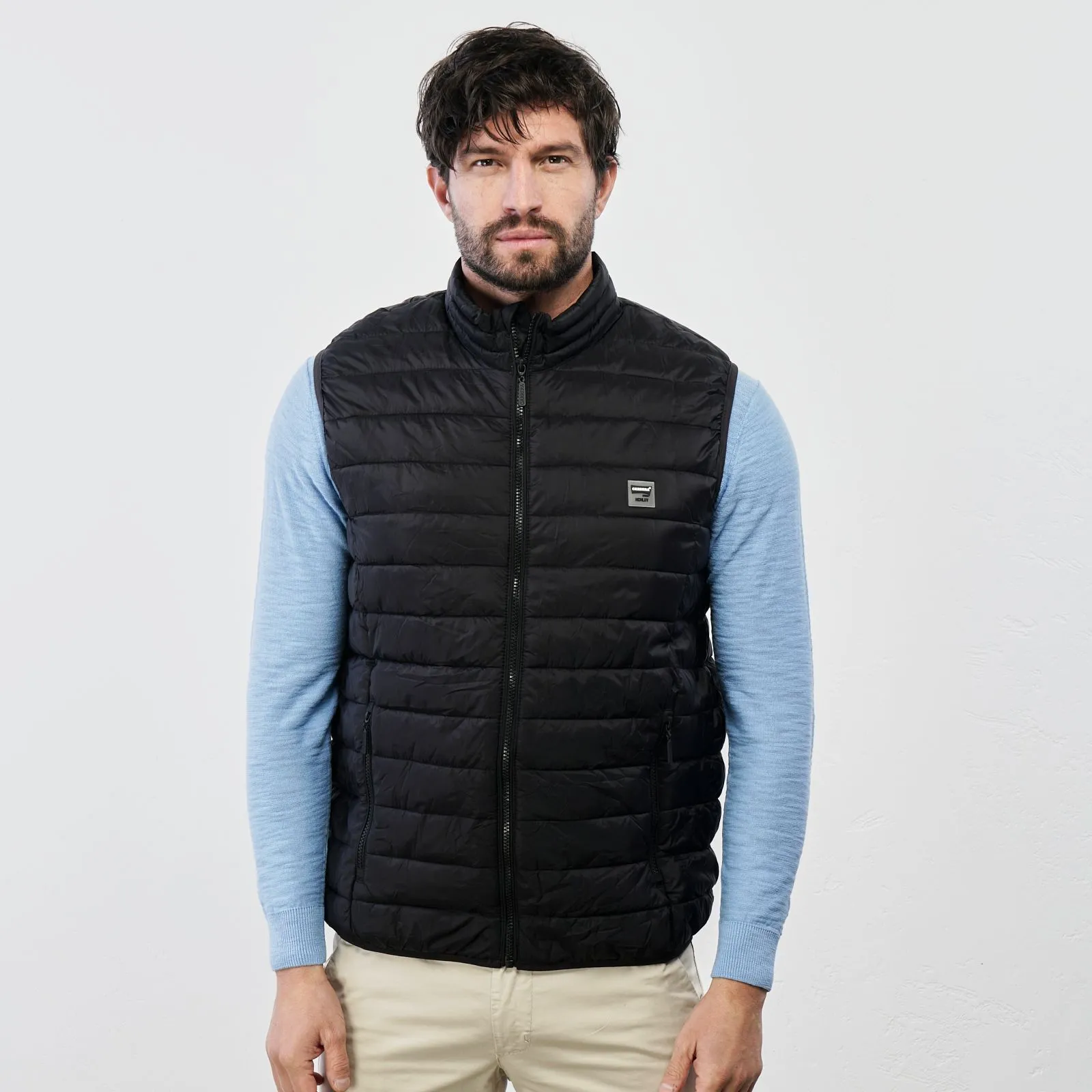 Black padded vest with pockets and zip