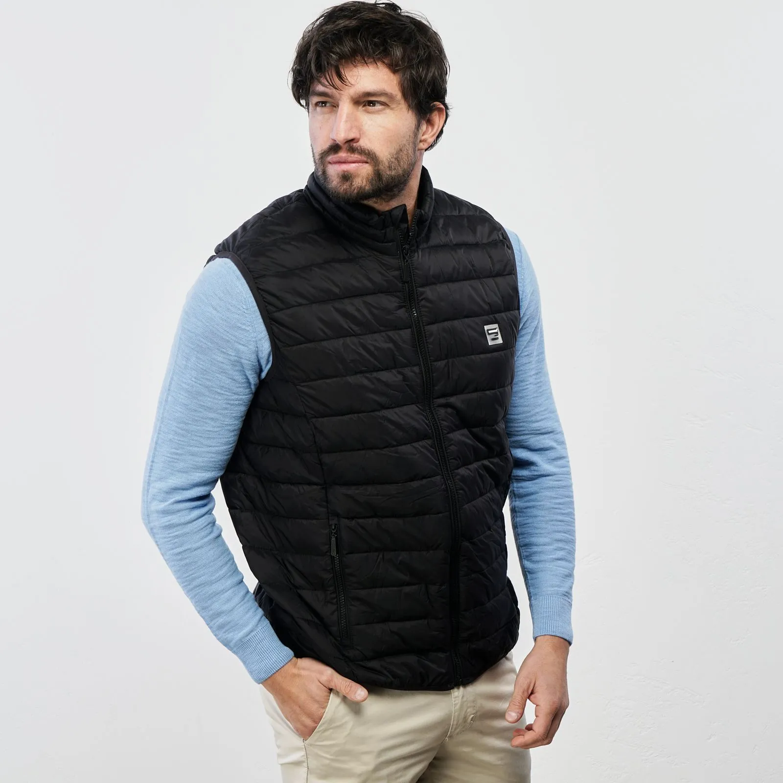 Black padded vest with pockets and zip
