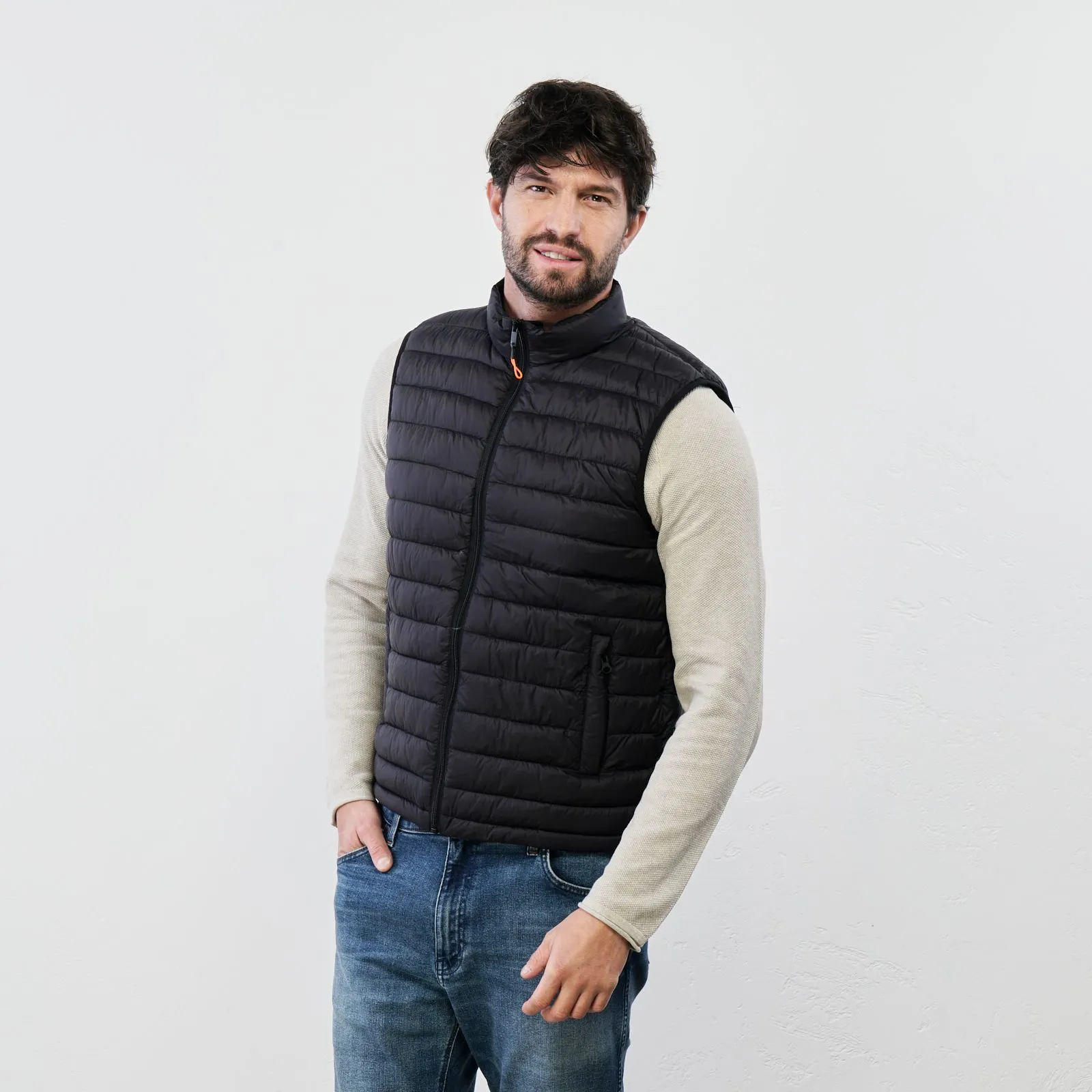 Black padded vest with zip and pockets