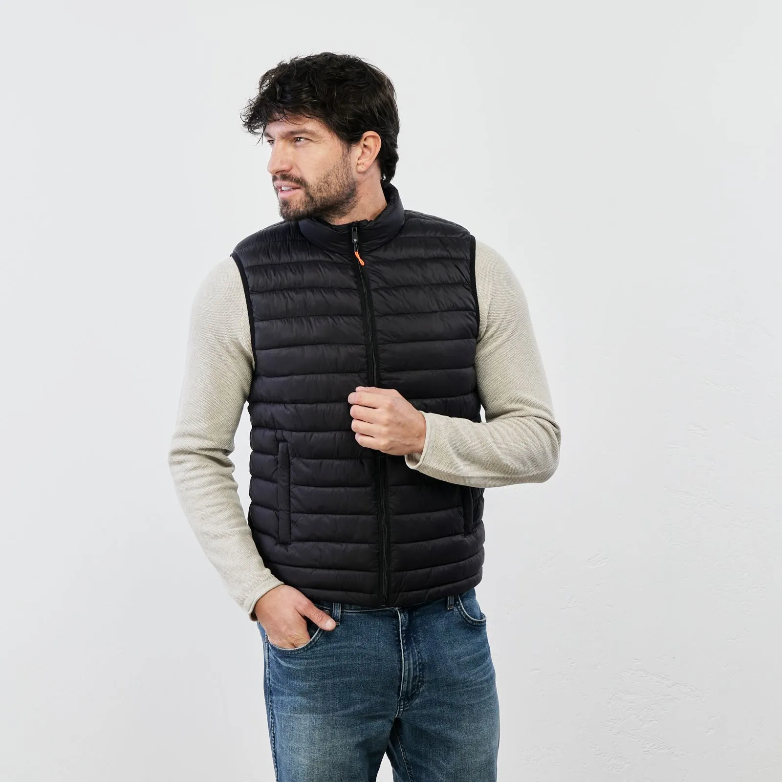 Black padded vest with zip and pockets