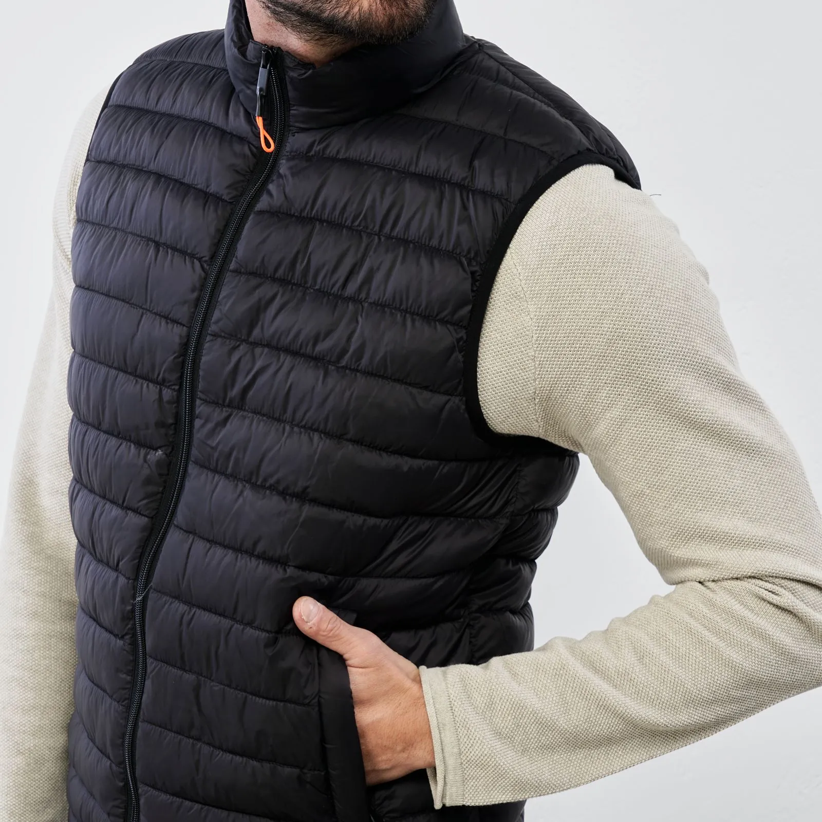 Black padded vest with zip and pockets