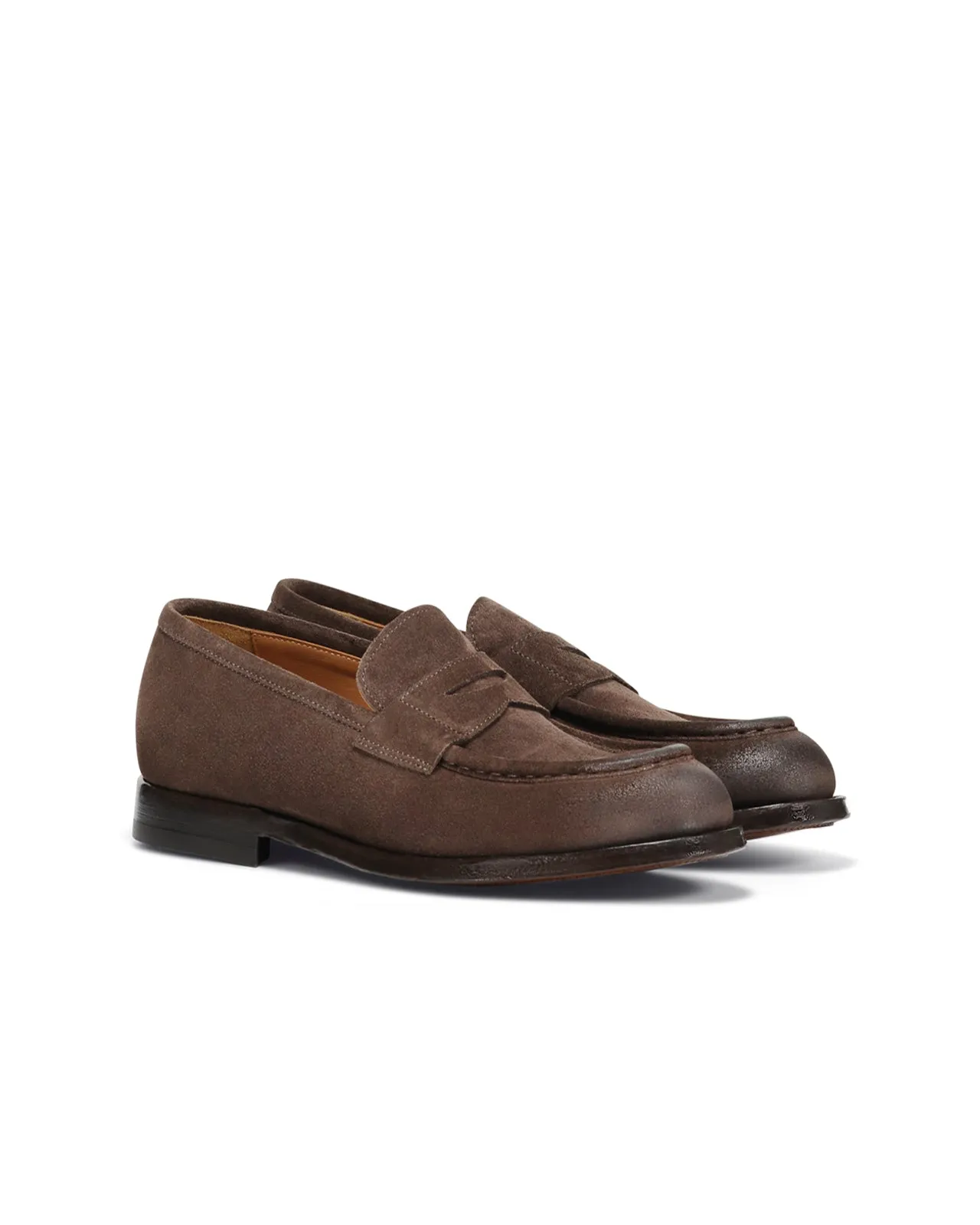 Brown suede moccasin.