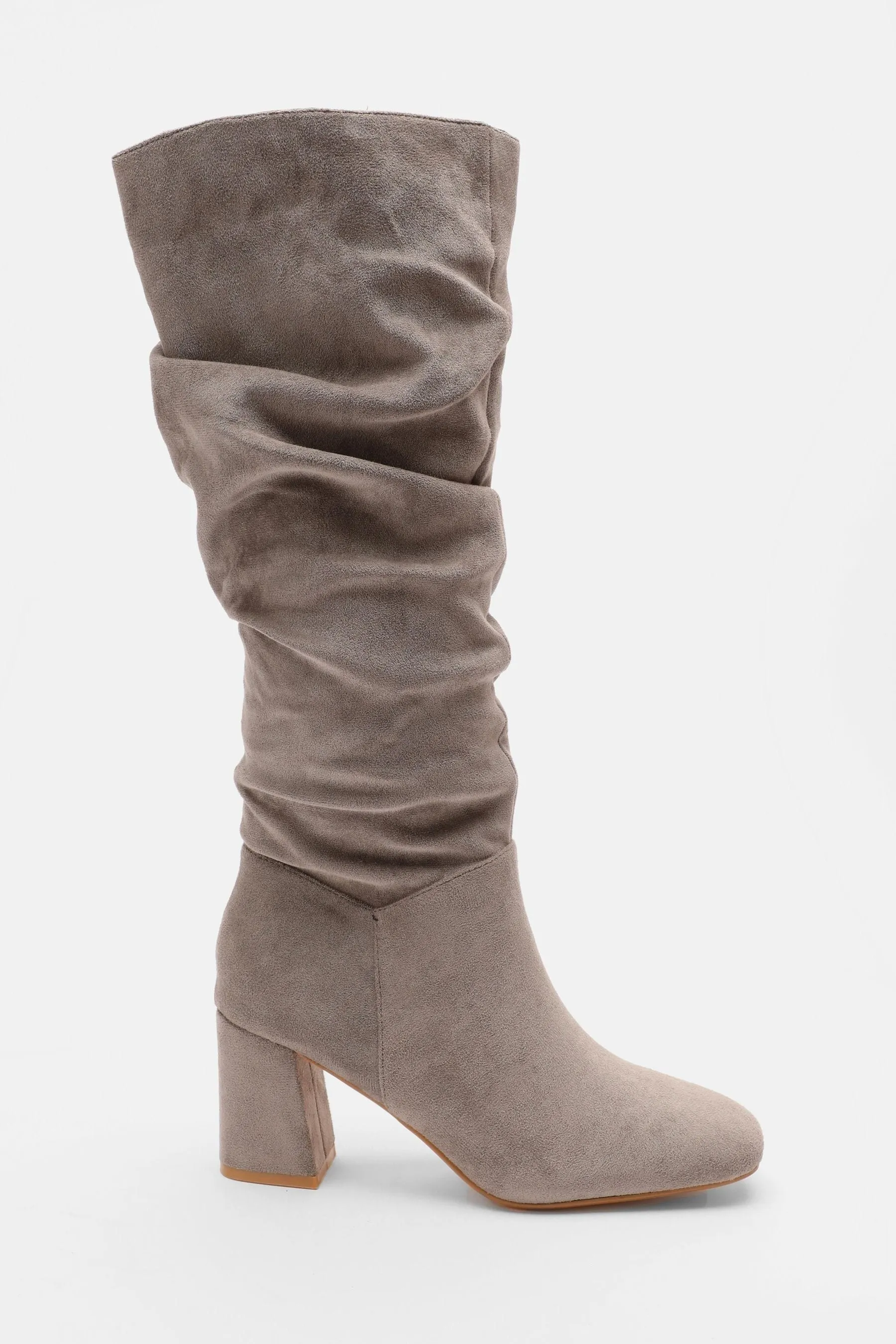 Knee-high boots with ruching and chunky heel quiz.