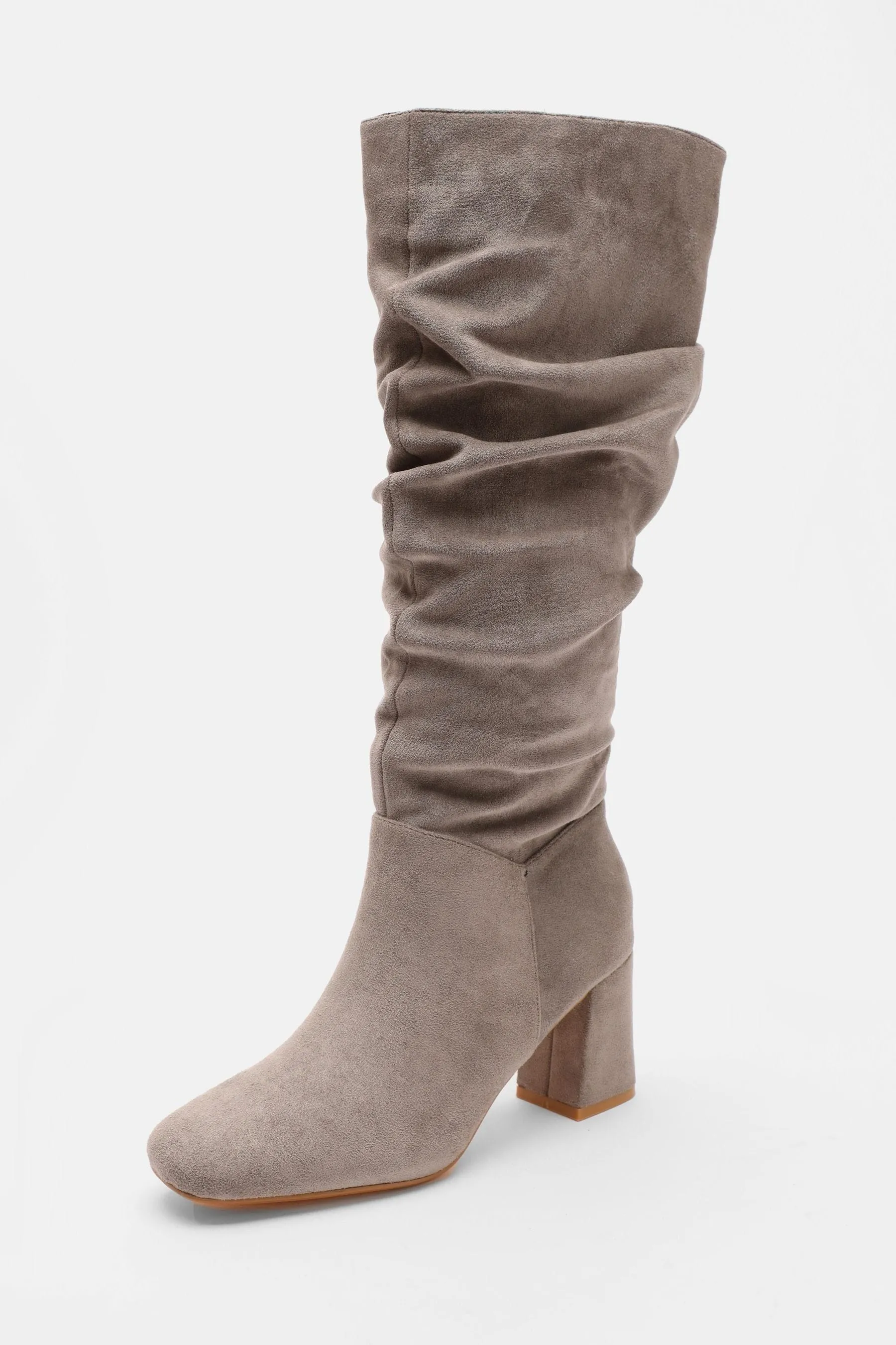 Knee-high boots with ruching and chunky heel quiz.