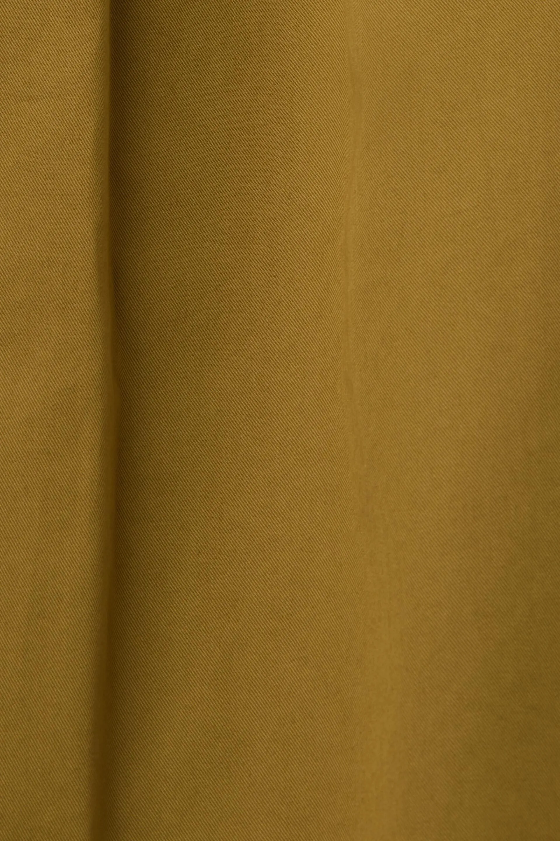 Knee-length skirt with belt, made of 100% cotton.