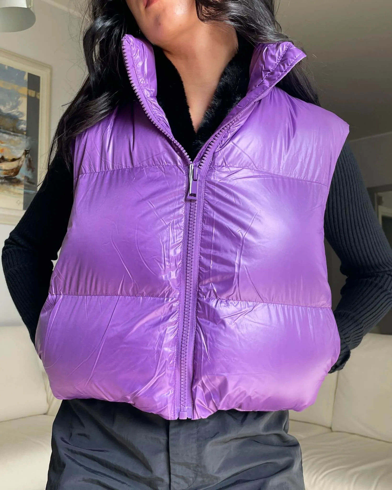 Purple padded shiny vest.