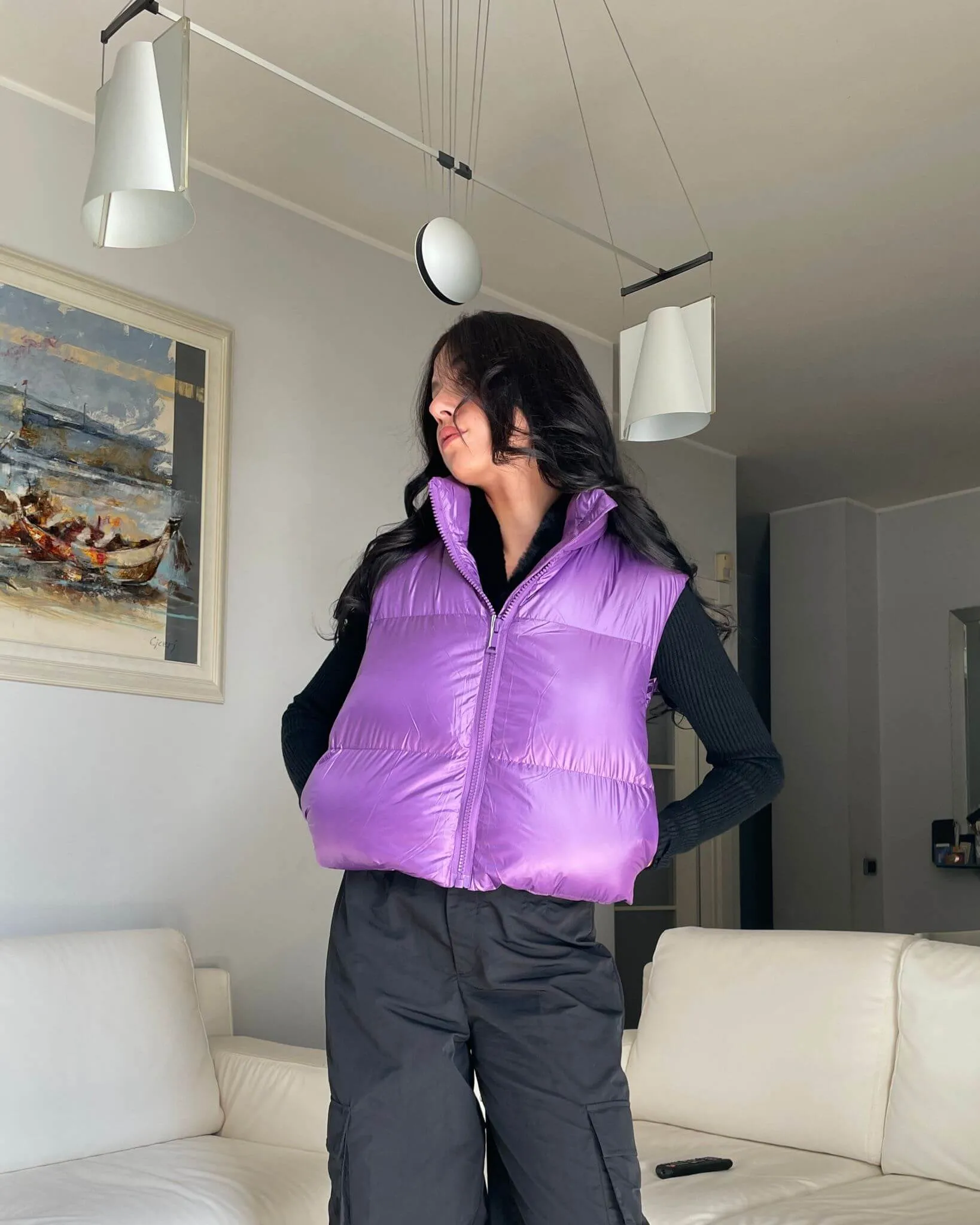 Purple padded shiny vest.