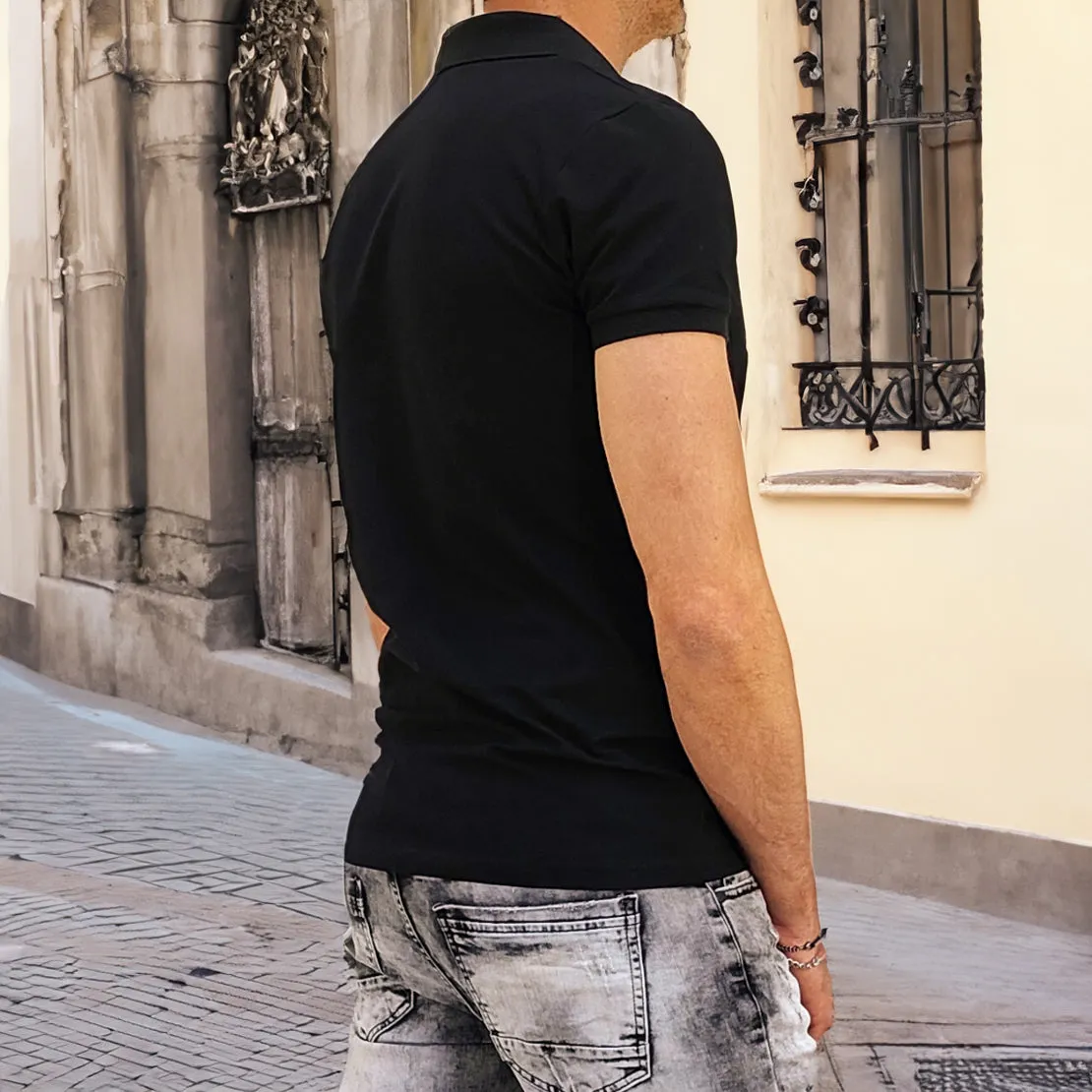 Short-sleeved black polo shirt.