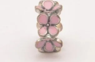 Silver floral pendant with rose motif.