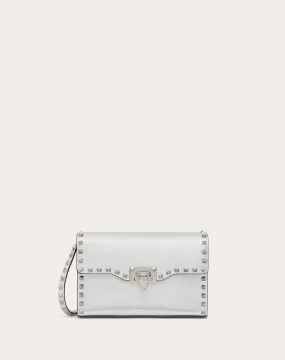 Small Rockstud crossbody bag in metallic garnet calf leather