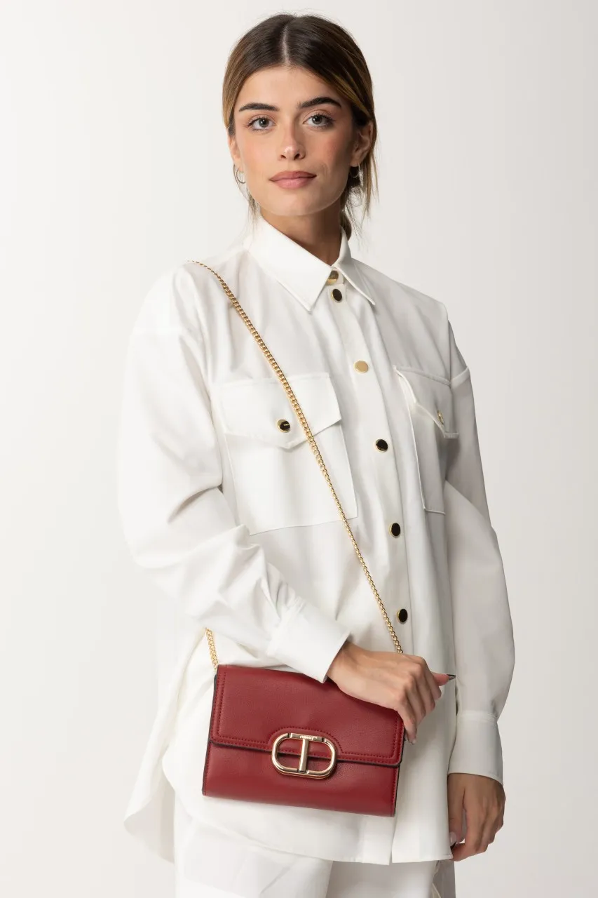 Small shoulder bag with fiery red logo flap