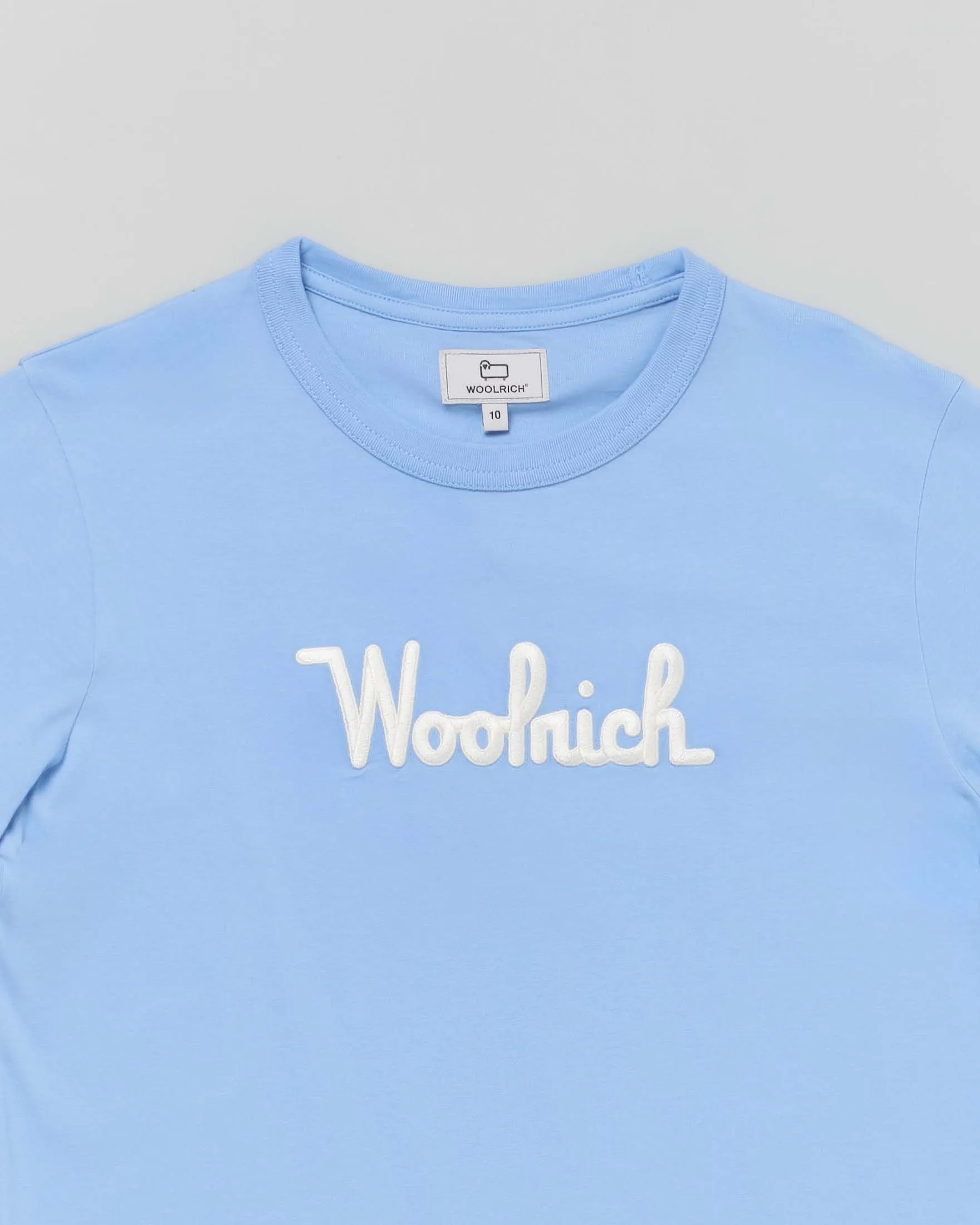 T-shirt azzurra in cotone a maniche corte con scritta logo bianca 10-16 anni